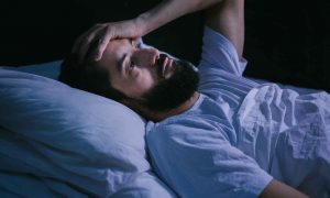 man-waking-up-from-bad-dream
