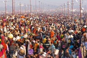 Kumbh Mela Hindu Festival, 2013, occurs every 12 years. Crowd of religious pilgrims taking holy bath in the Ganges River, Allahabad.