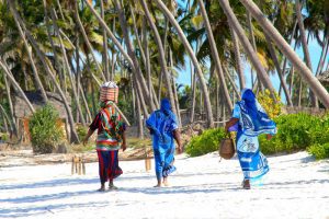 zanzibar-women-sandy-beach-9754011