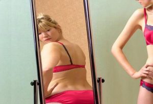 understanding-eating-disorders-s11-photo-of-distorted-reflection