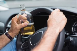 Whiskey-In-Hand-While-Driving