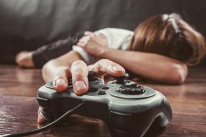 game-addict-laying-on-the-floor