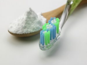 Toothbrush and baking soda to clean
